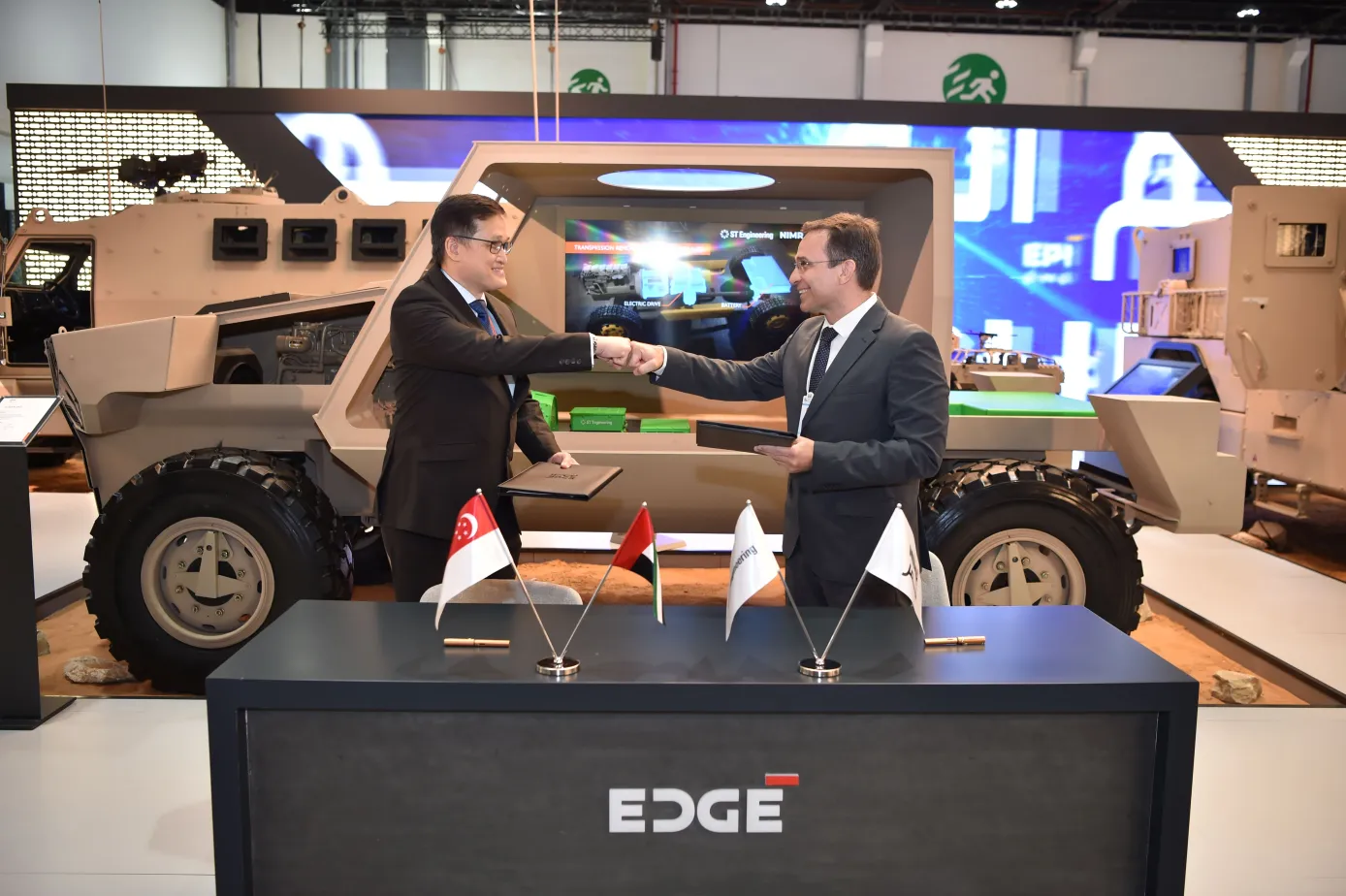 C_Abri du Plessis, CEO of NIMR and Daniel Lam, Head, Middle East of ST Engineering signed the MOU to hybrid electric drive (HED) systems_0.