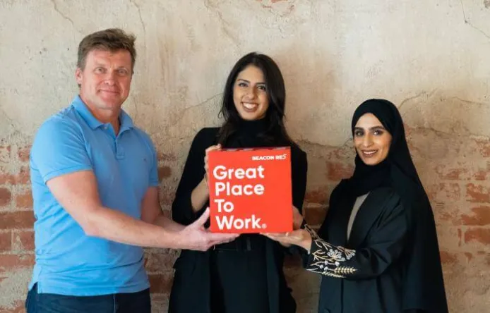 beacon-red-great-place-to-work-left-to-right-michal-mularski-hanaa-ahmed-rahaf-alali.jpg